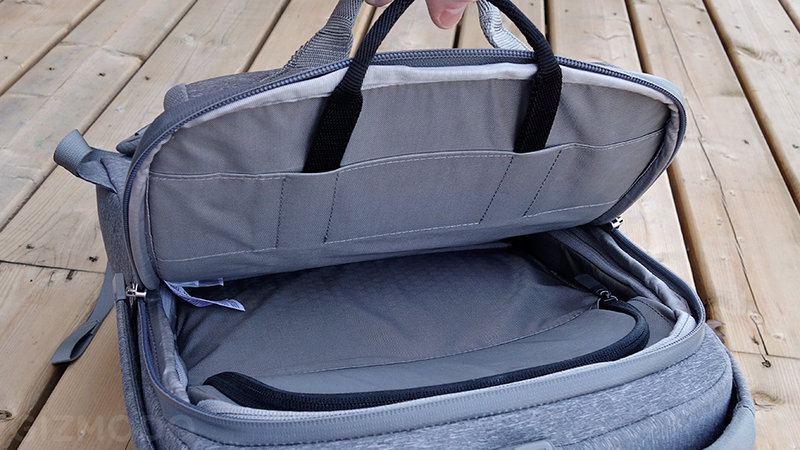 A dedicated computer pocket can handle laptops up to 15-inches in size, which can be easily removed with a tug on a handle.